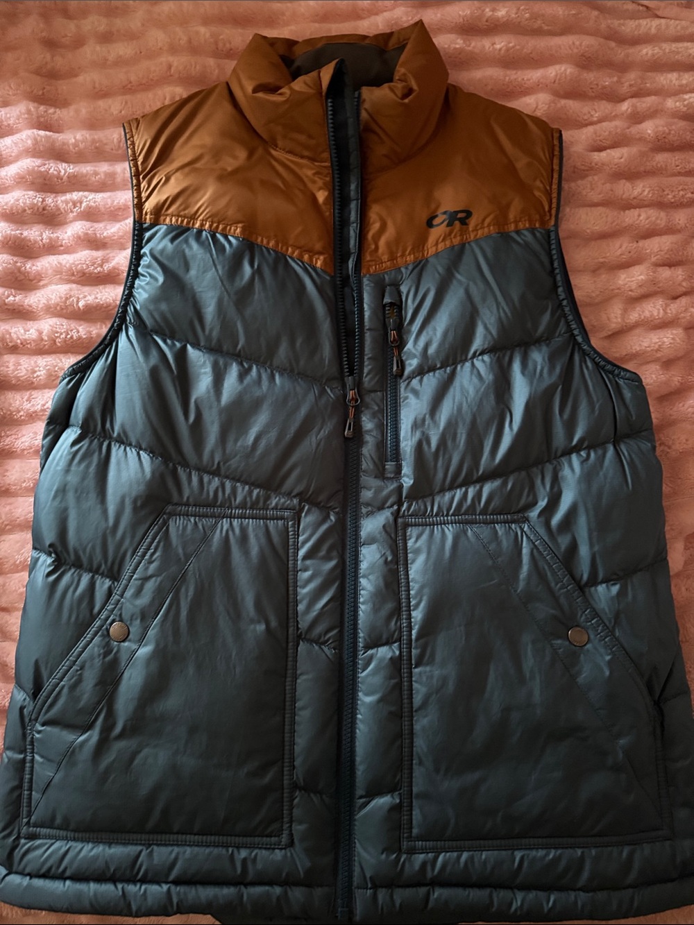 Outdoor Research vest in blue and Tan